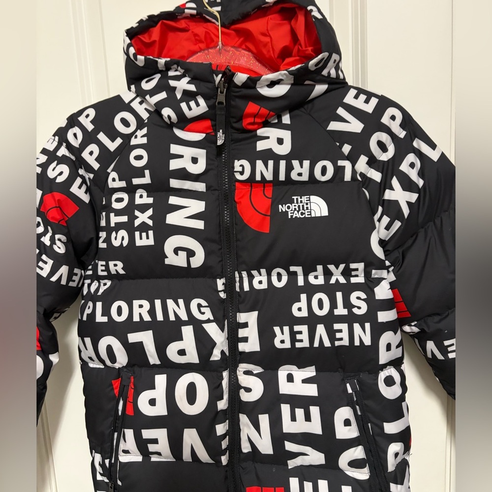 The North Face Black Graphic and Red Reversible Down Jacket